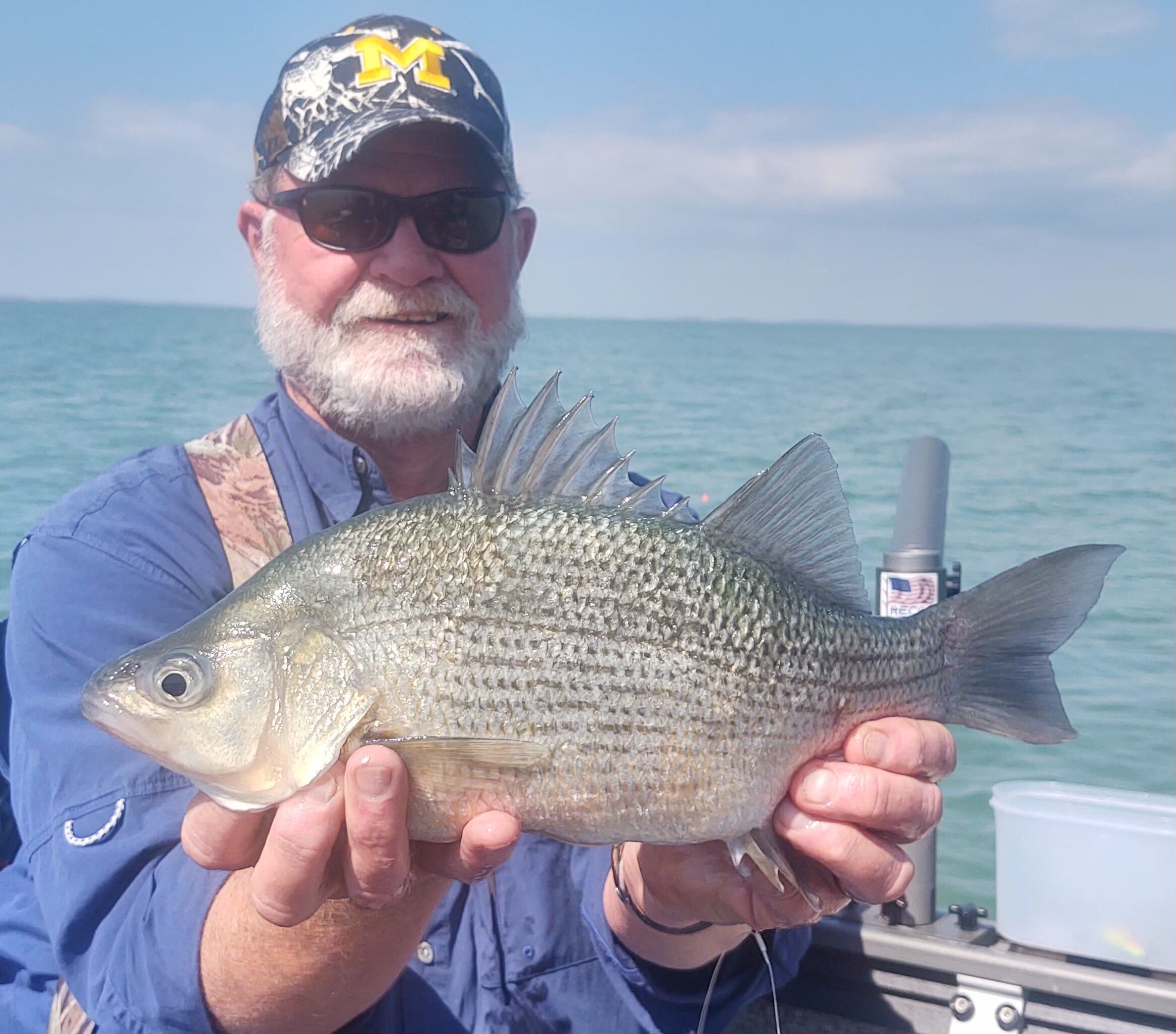Adrian man reels in record-breaking white perch - Vimarsana News