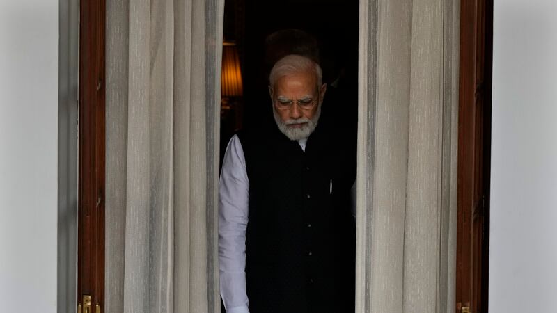 FILE - Indian Prime Minister Narendra Modi leaves to receive Nepal’s Prime Minister Pushpa...