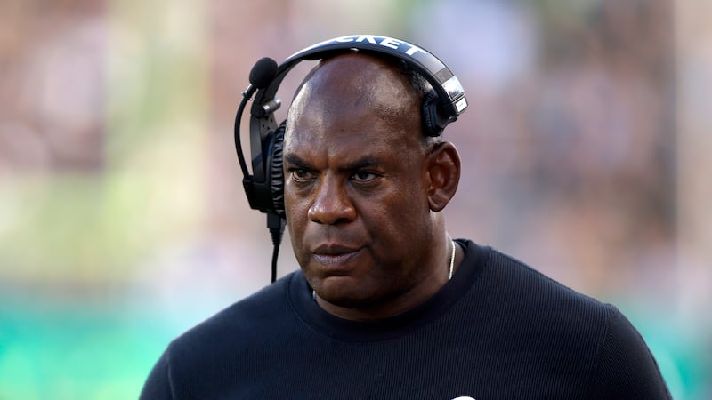 FILE - Michigan State coach Mel Tucker walks the sideline during the second half of an NCAA...