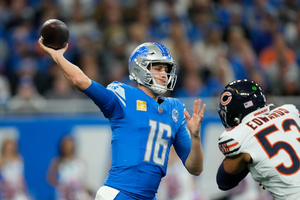 Detroit Lions quarterback Jared Goff throws during the first half of an NFL football game...