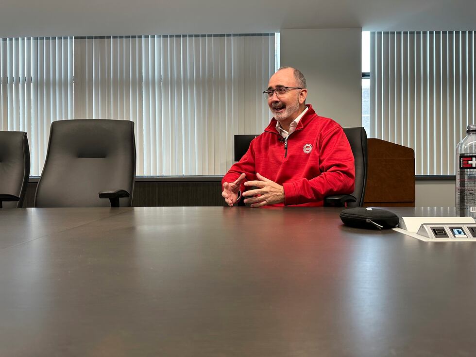 United Auto Workers President Shawn Fain speaks to a reporter from The Associated Press during...