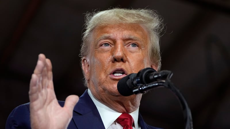 FILE - Former President Donald Trump speaks during a commit to caucus rally, Monday, Oct. 16,...