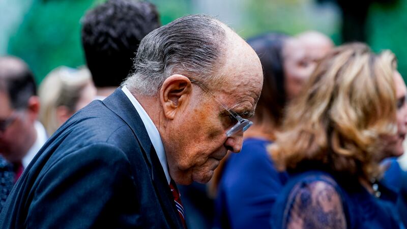 FILE - Former New York City Mayor Rudy Giuliani arrives to the ceremonies to commemorate the...