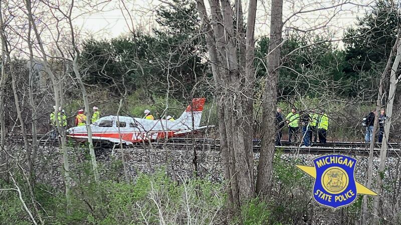 A small plane landed on railroad tracks near Bishop International Airport in Flint on Thursday.