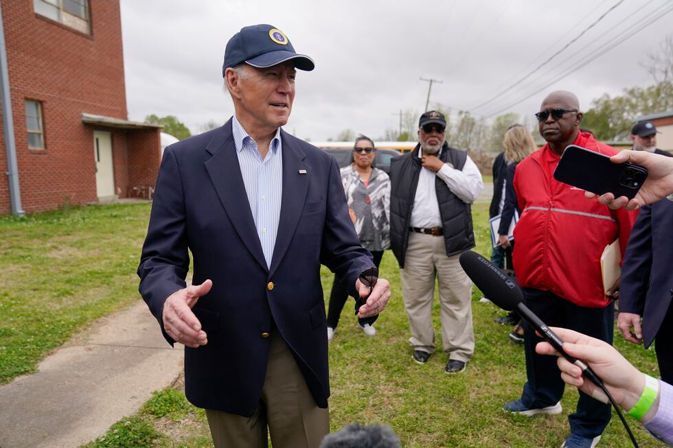 President Joe Biden speaks with members of the media after a briefing in Rolling Fork, Miss.,...