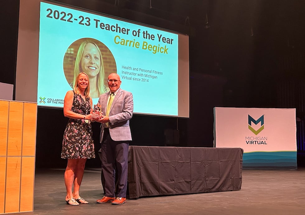 Jamey Fitzpatrick, president and CEO of Michigan Virtual presents Carrie Begick, health and...