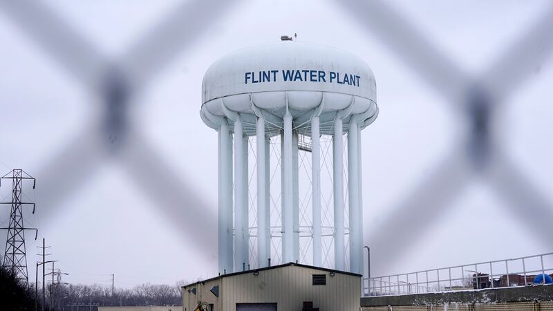 The Flint water plant tower is seen, Thursday, Jan. 6, 2022, in Flint, Mich. After Flint's...